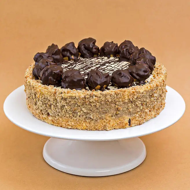 Praline Halo butterscotch cake with crunchy praline coating and chocolate topping