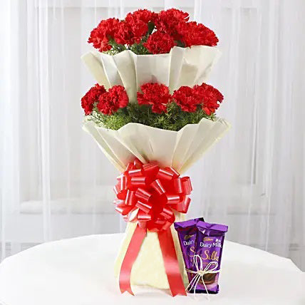 20 red carnations layered bouquet with Dairy Milk Silk chocolates flower chocolate combo gift