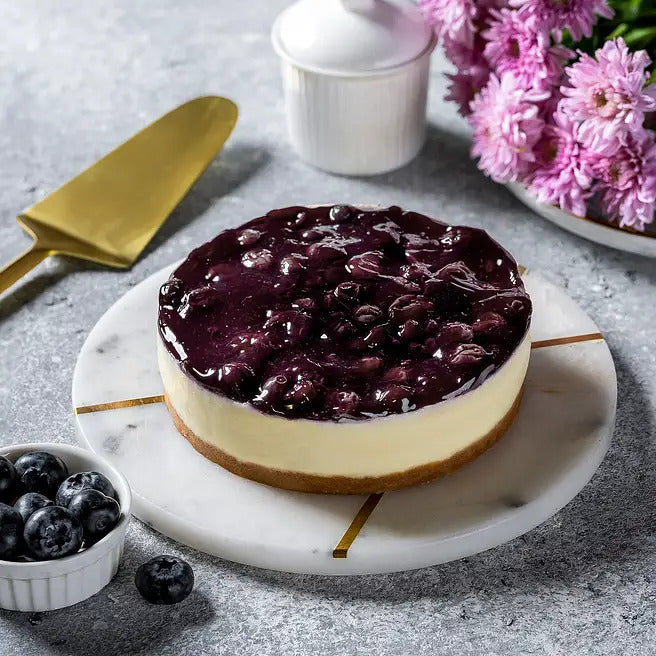 Blueberry Serenade cheesecake with creamy layer, biscuit base and blueberry topping