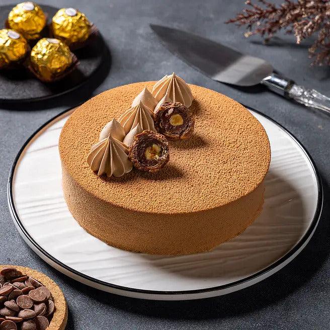 Hazel Mousse chocolate mousse cake with hazelnut praline topping and chocolate cream swirls
