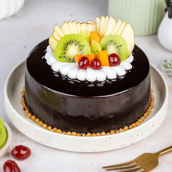 Orchard Ganache fruit chocolate cake with kiwi, apple, mango and cherry topping
