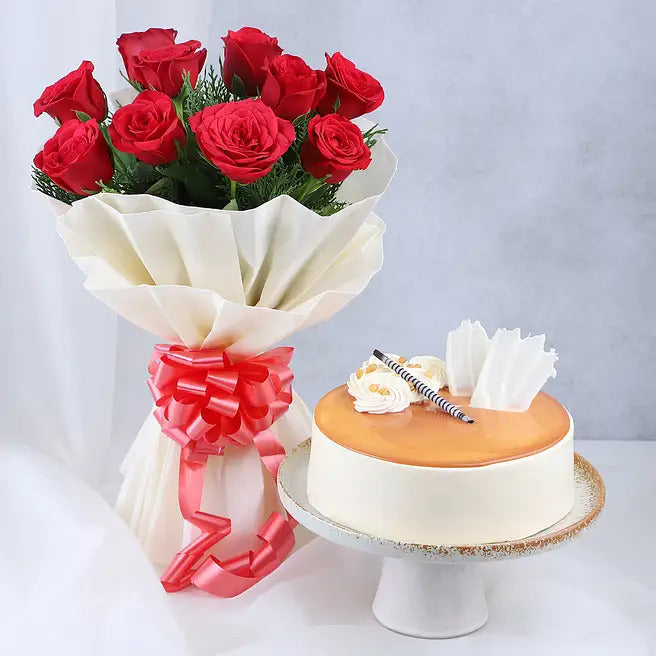 Scarlet Sweetness 10 red roses bouquet with eggless butterscotch cake and ivory wrapping
