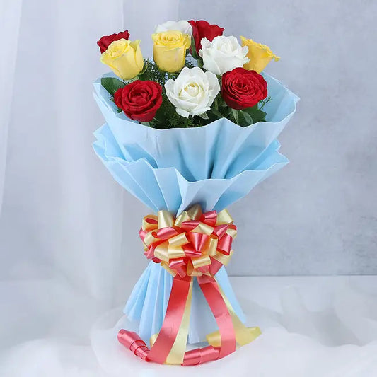 Trio Radiance bouquet of 10 red yellow and white roses in premium blue wrapping