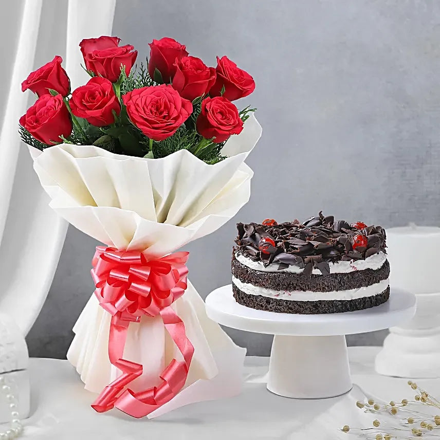 Red roses bouquet with eggless Black Forest cake combo for birthday and anniversary gift