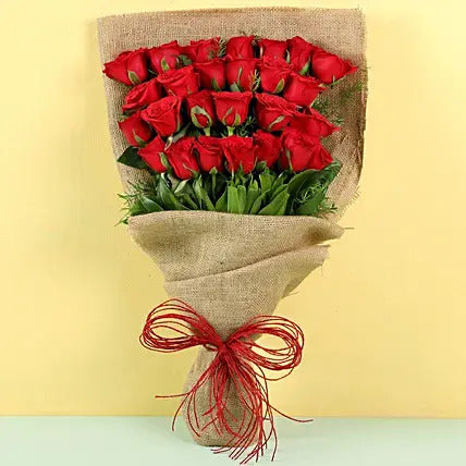 Red roses bouquet in jute wrap rustic romantic flower gift