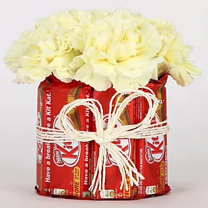Yellow carnations with KitKat chocolates arrangement flower chocolate combo gift
