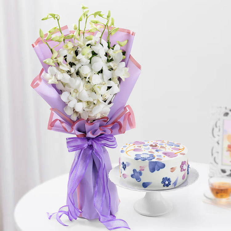 White orchid bouquet with floral designer cake for same day gift delivery India