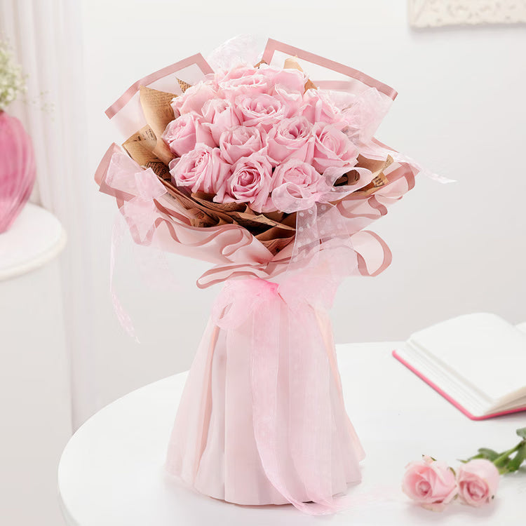 15 Sweet Avalanche pink roses bouquet in premium pink wrapping for flower delivery India