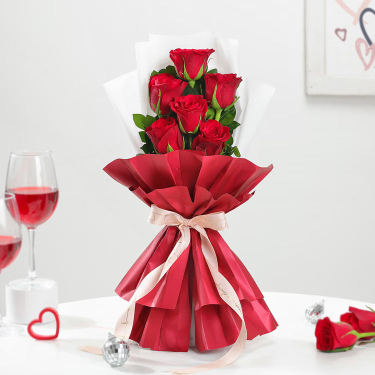 6 red roses bouquet in red and white wrapping for romantic flower delivery
