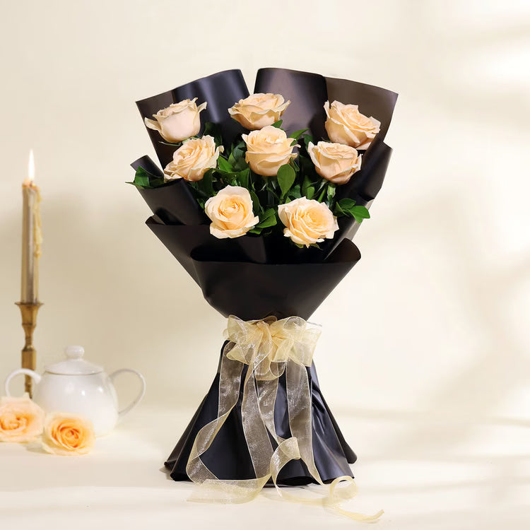 Champagne Rose Black Wrap Bouquet with fresh cream roses and golden ribbon