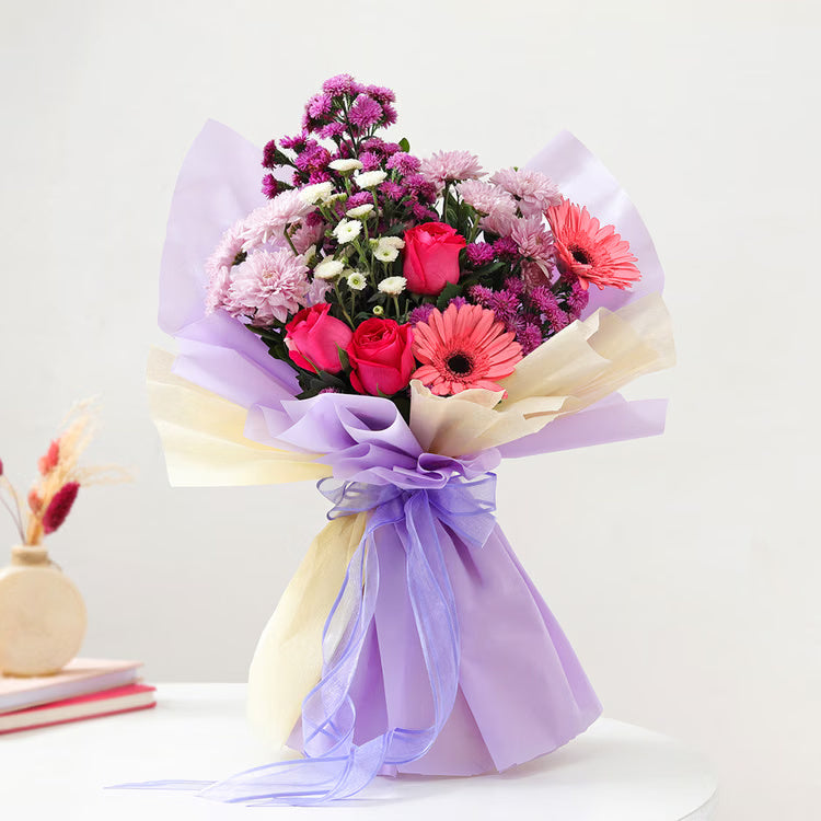 Pastel Rose Gerbera Bouquet with pink roses, gerberas, chrysanthemums and lavender wrapping