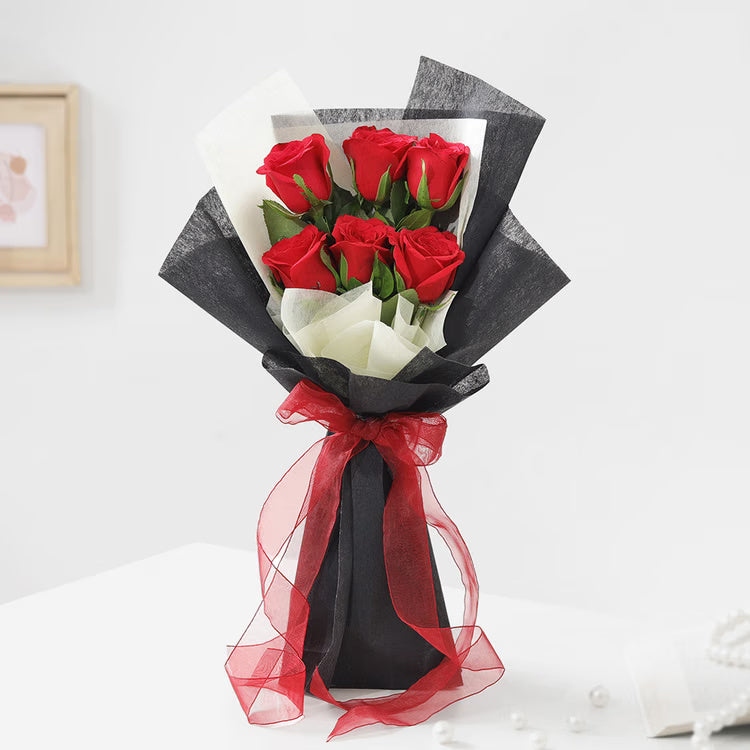 Black Wrap Red Rose Bouquet with fresh red roses and red ribbon decoration