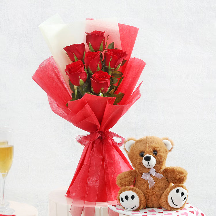 Fresh red roses bouquet with cute teddy bear gift combo for romantic delivery