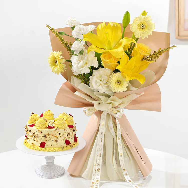 Yellow lilies and roses bouquet with Rasmalai cake for birthday anniversary and festive gift