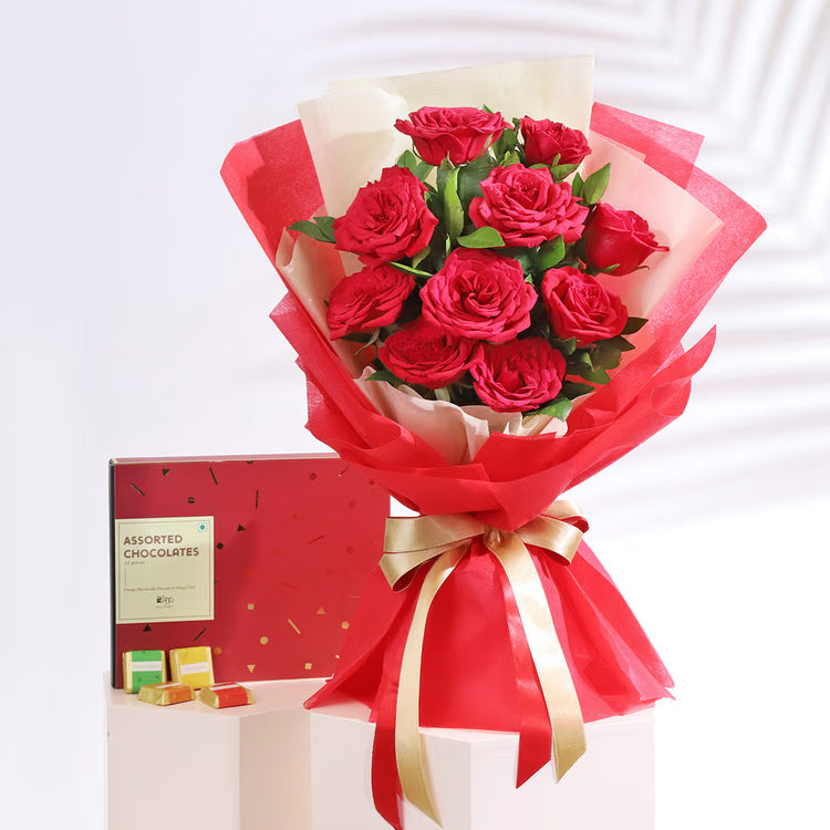 Fresh red roses bouquet with assorted chocolates box for romantic gift delivery