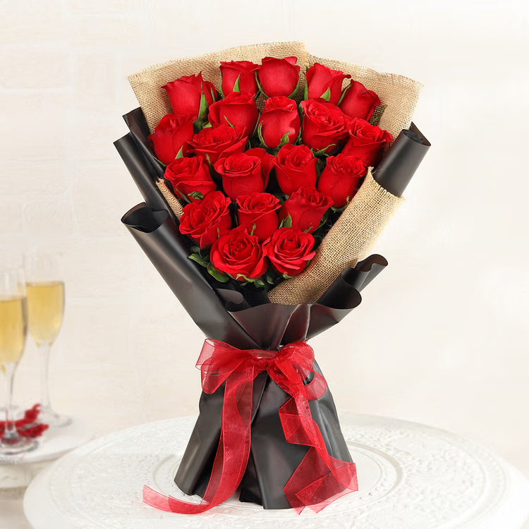 20 fresh red roses bouquet in black and jute wrapping with red ribbon