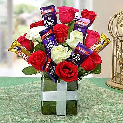 Red and white roses with chocolates arrangement in glass vase flower chocolate combo gift