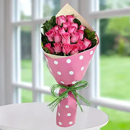 Pink roses bouquet in polka wrap cute flower gift