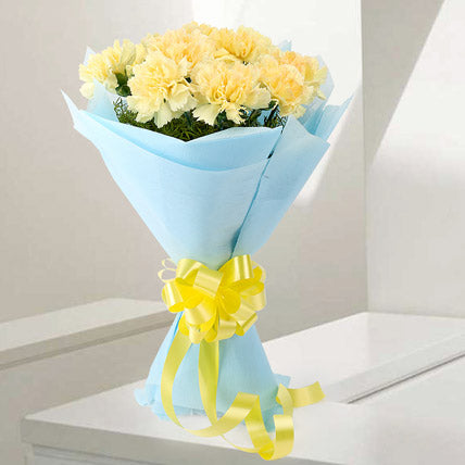 Fresh Yellow Carnation Bouquet with Blue Wrapping for Same Day Delivery in India