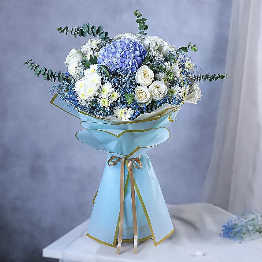 Blue hydrangea and white roses bouquet in premium sky blue wrapping for birthday and congratulations gift