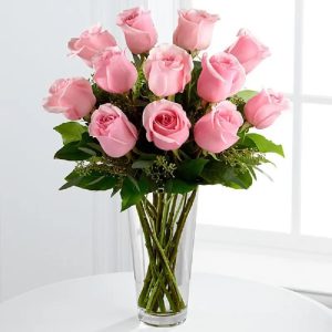 Fresh pink roses in glass vase for birthday anniversary and love gift