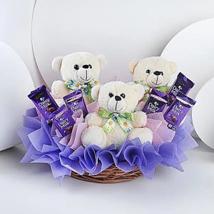 Three teddy bears with Dairy Milk chocolates in gift basket for birthday and kids surprise