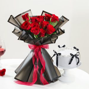 Red roses bouquet with classic white cream cake for romantic gift delivery