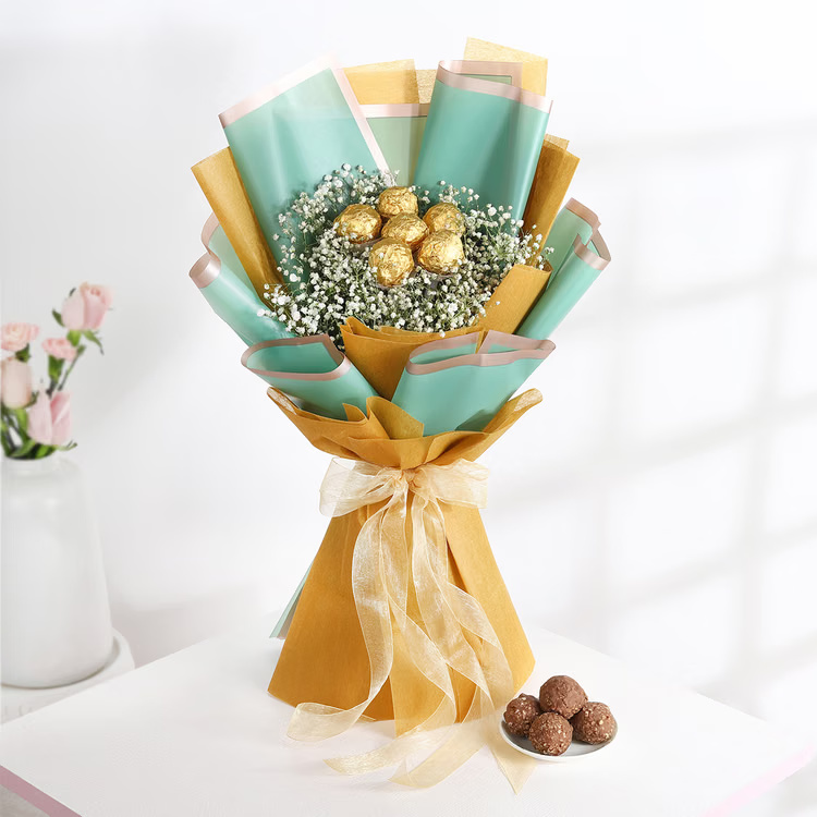Golden chocolate bouquet with baby’s breath fillers in premium mint gold wrapping for birthday and anniversary gift