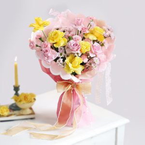 Pink and yellow roses bouquet in premium pink wrapping for birthday anniversary and congratulations gift