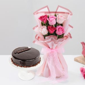 Pink and white roses bouquet with chocolate truffle cake for birthday anniversary and romantic gift