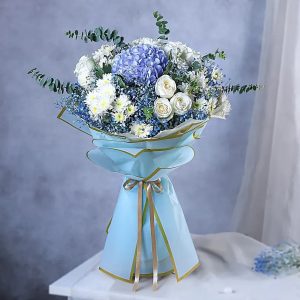 Blue hydrangea and white roses bouquet in premium sky blue wrapping for birthday and congratulations gift